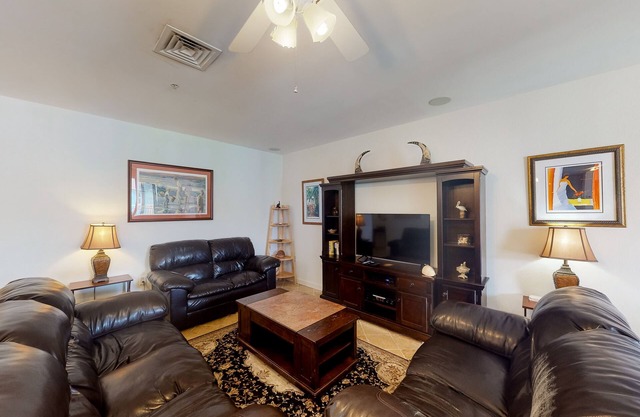 Ocean-view penthouse with balconies, pool, foosball, & gym - 30-day minimum
