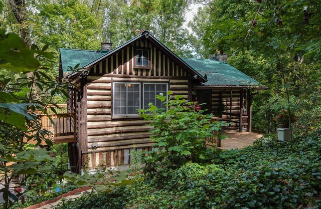 Old World Swiss Cabin Nestled In Woods Ancient Lore & Neyland Stadium Close by