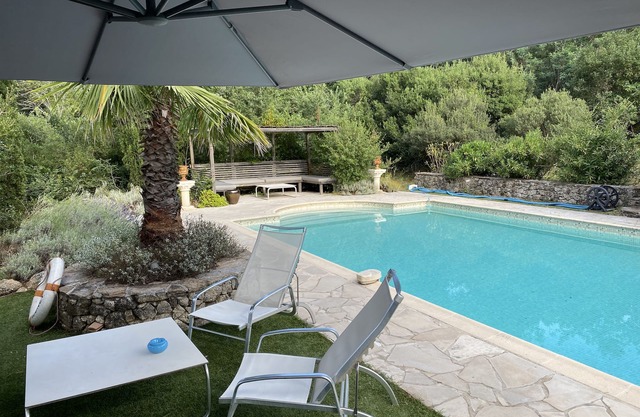 One Bedroomed Self Contained Guest Cottage with large private terrace and pool
