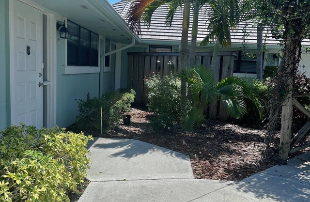 One level villa. Clubhouse, pool, tennis. Barbeque on patio. Two parking spaces.