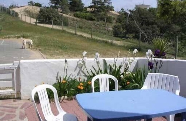One-storey terrace 10 m away from the dune and the pine-wood, beach 150 m away