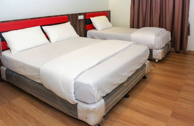 OYO 90027 Happy Hotel