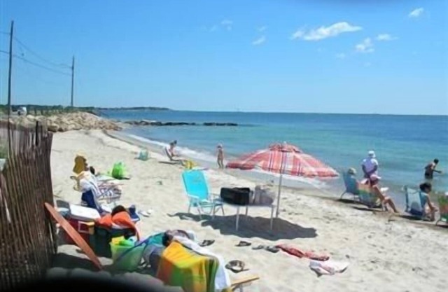 Panoramic ocean views, steps to beach and bike path