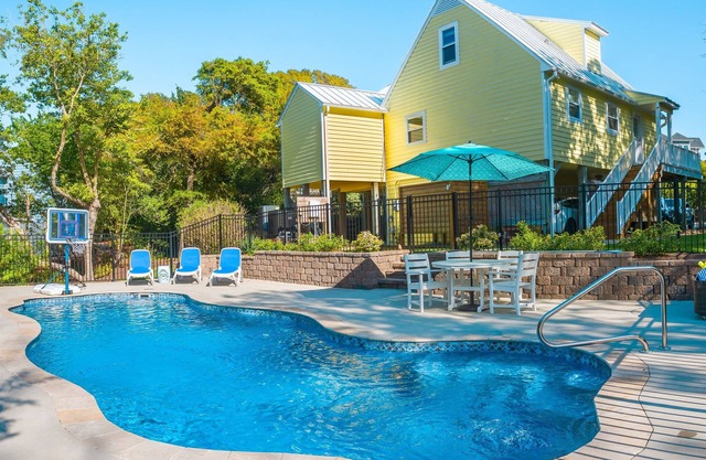 Peaceful 4BR Beach Escape w/Famous Heated Mystery Pool™ | 2-min Walk to Beach