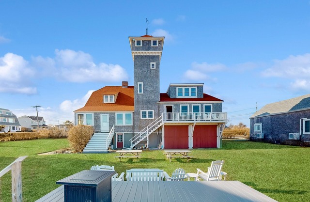Peaceful ocean view apartment with direct beach access, grilling area, & firepit