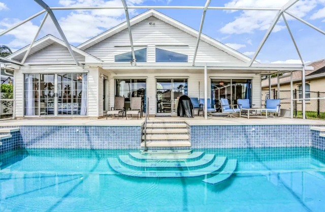 Peaceful Waterfront Pool Home by RedAwning