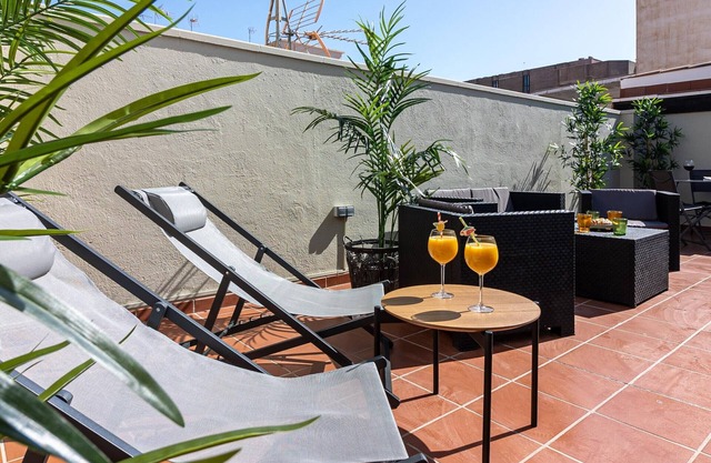 Penthouse spacieux au centre de Malaga avec 1 chambre, balcon, WiFi, climatisation et cuisine équipée