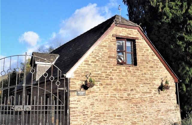 Penybont Barn a cosy riverside barn conversion in Llangorse, the Brecon Beacons