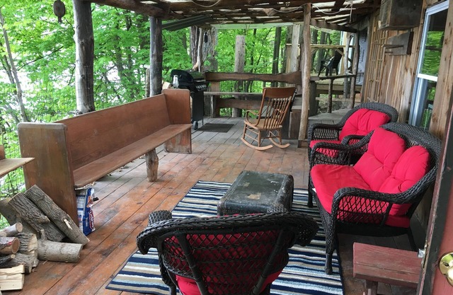 Perched over private beach on Cayuga Lake