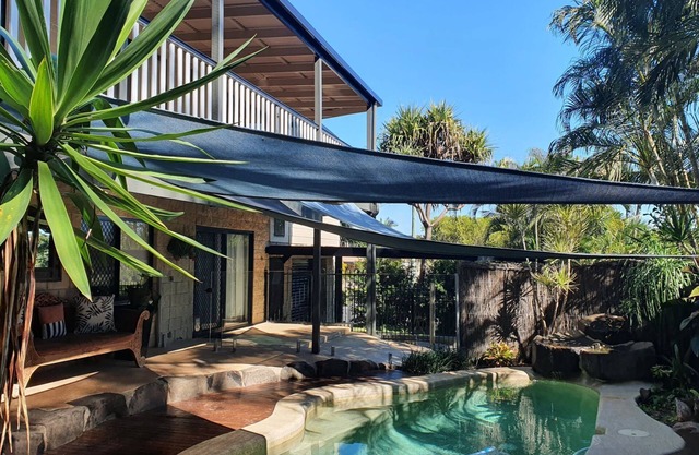 Perfect large 2 storey level home for 2 families with a pool.