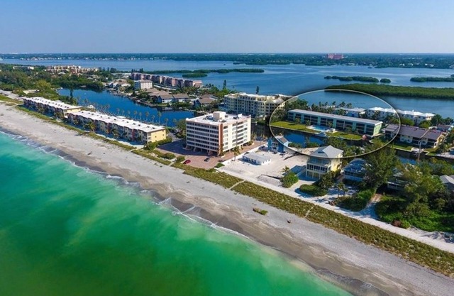 Perfect Location. Beautiful Waterviews. Heated Pool. 2 BD/2 BA