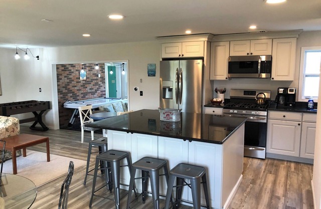 Pet-Friendly Beach House with Game Room & Outdoor Shower - Steps to Pool & Beach