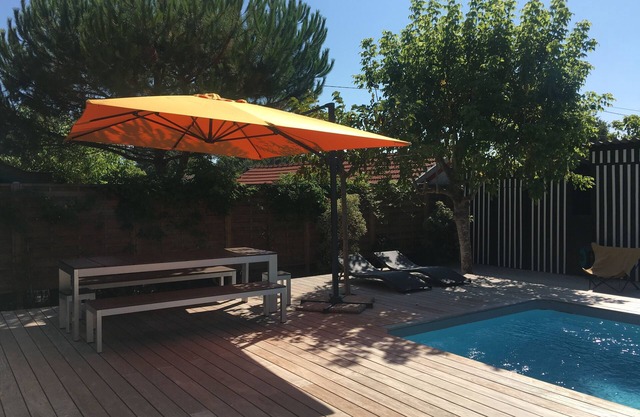 Pleasant wooden house with character, design decoration and swimming pool