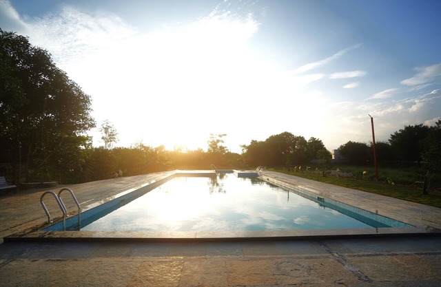 POOL PARTIES,GARDEN PARTIES, with 5 king size bed rooms and a massive huge pool.