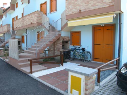 Poolside getaway seaside flat in Rosolina