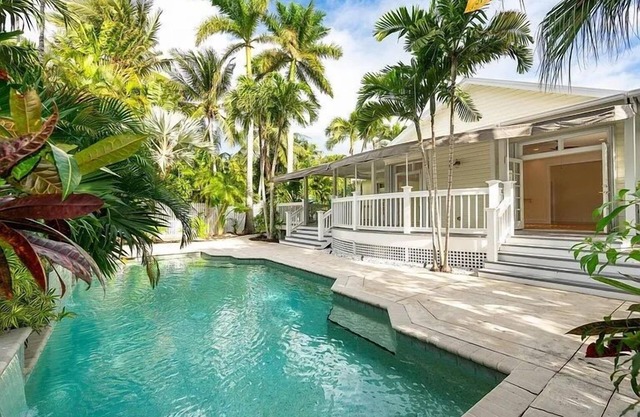 POOLSIDE PARADISE ~ Charming 3 BR/2Ba Home w/Pool!