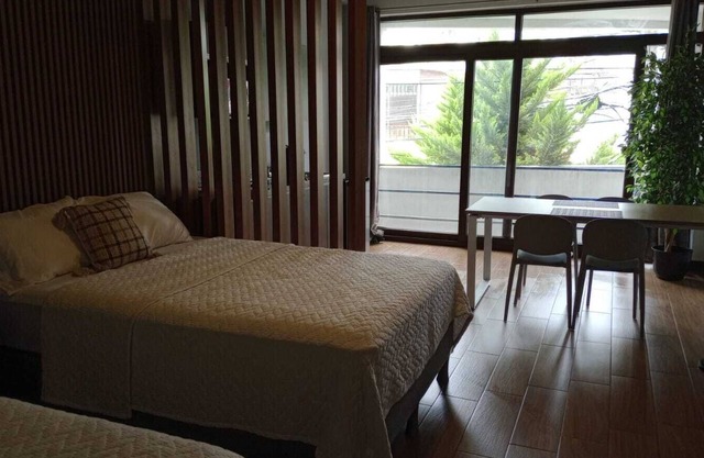 Premium Studio with Balcony in zone 10