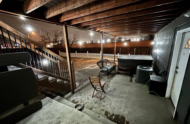 Private 1 bedroom guest suite with private living room, laundry, & kitchenette