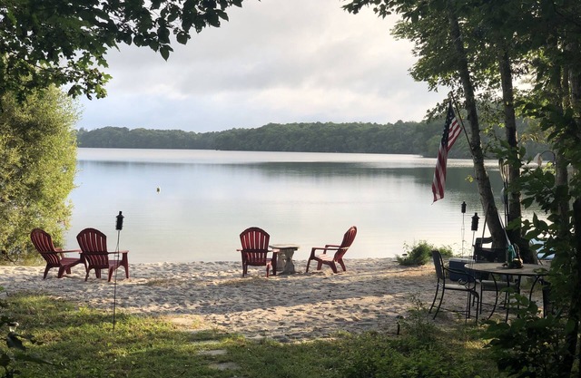 Private beach and wooded retreat on Coonamessett Pond