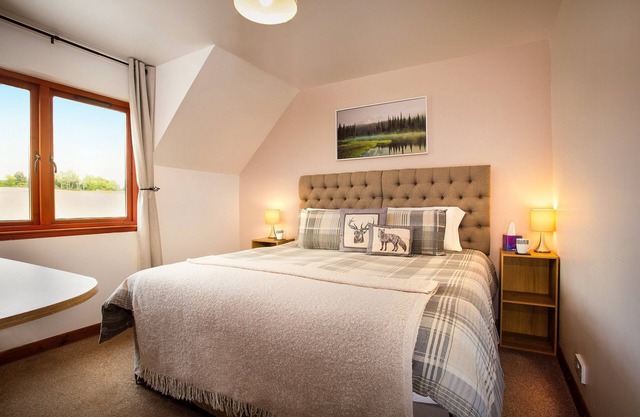Private En-Suite Room with calming views over barley fields and forests beyond.