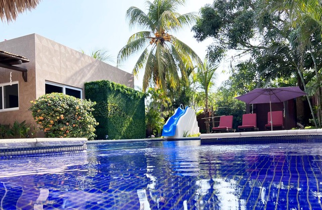 Private family house, with pool, water slide and swings.