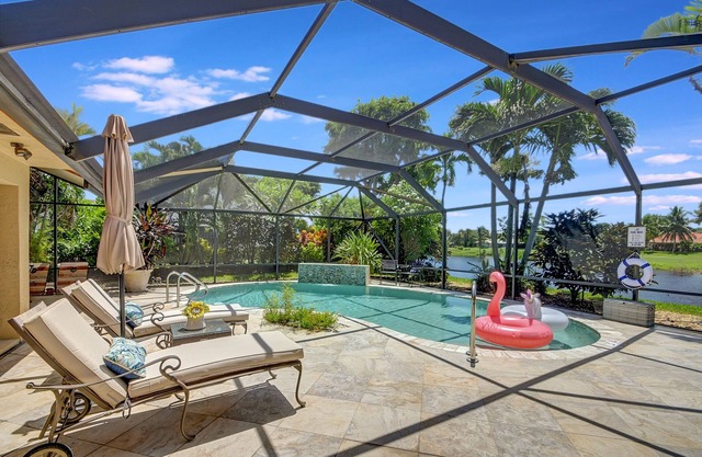 Private Oasis in Delray Beach with pool, game room and lake views!