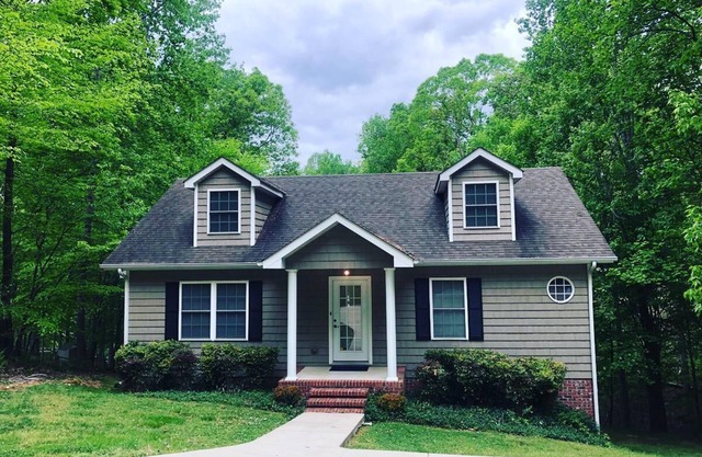Private, wooded, waterfront home at end of cove
