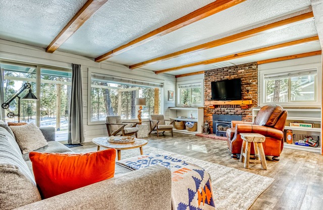 Quaint, riverfront home with woodstove, patio, deck, board games & washer/dryer