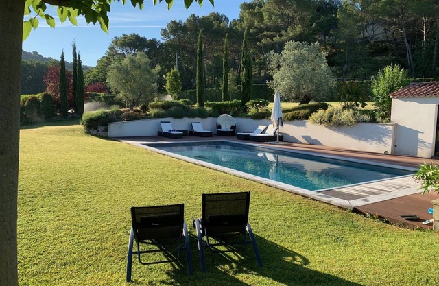 Quiet contemporary house with secure heated pool and large garden