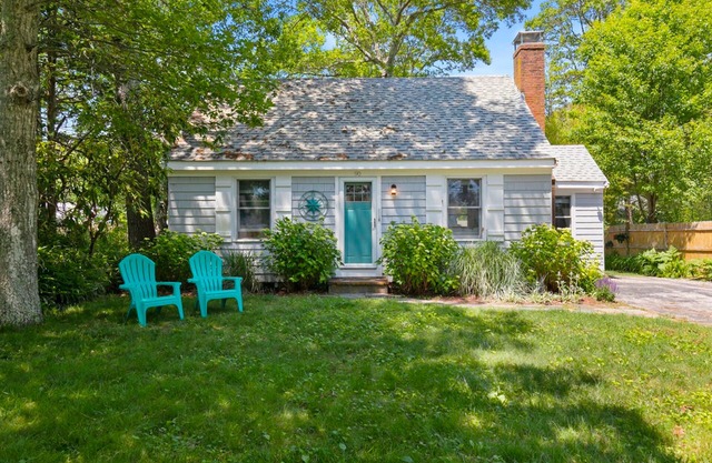 Quiet home near Great Pond with patio, W/D, AC, games, & private yard