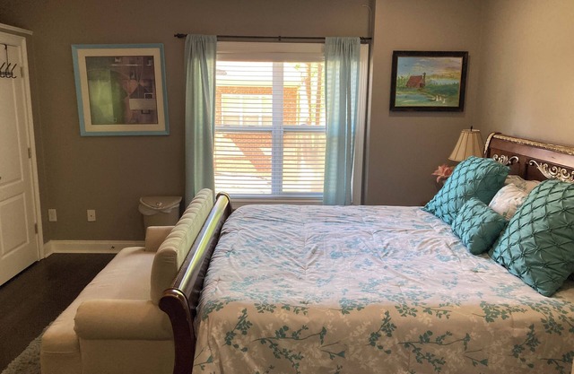 Recharge here. One large bedroom within a furnished, terrace level apartment.