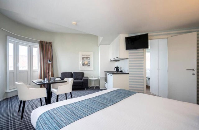 Relaxing Room with Kitchenette | Quick Access to Local Attractions