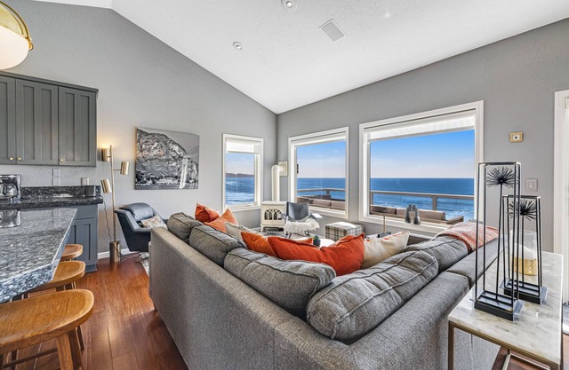 Remodeled home with multiple decks & ocean views - short walk to beach