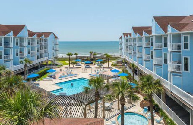 RENOVATED BEACHSIDE Condo-Elevator-Heated Pool-in unit Washer/Dryer