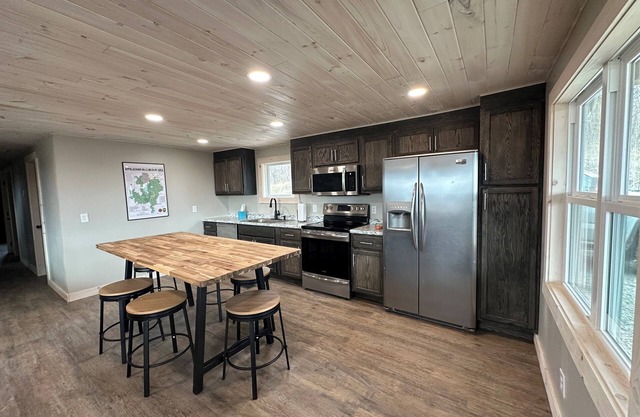Renovated cottage w/incredible views of 54000 acres of public recreational land.