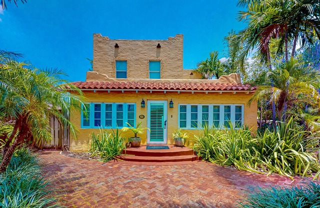 Renovated historic home with large pool, grill, enclosed yard, & gourmet kitchen