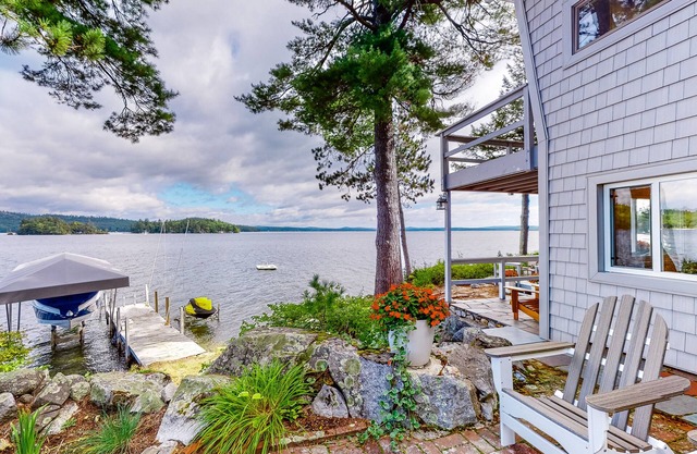 Renovated home with a water view, washer/dryer, AC, deck & wood stove
