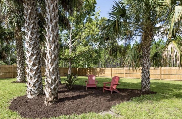 Residential home minutes from the beach with fenced in backyard!