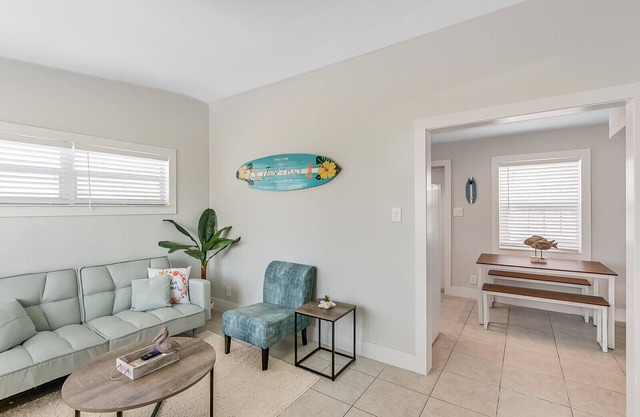 RIVERFRONT community in COCOA BEACH with short walk to the beach!