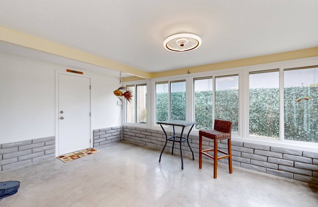 Riverfront home near downtown with dolphin sightings, private dock & home office