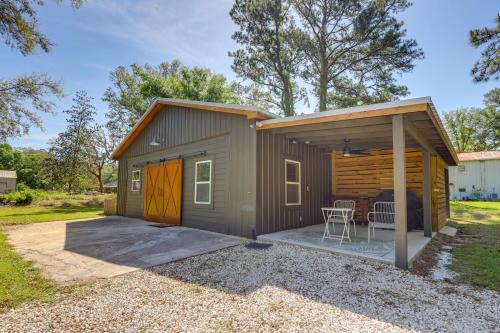 Riverfront Magnolia Springs Cabin Rental with Grill