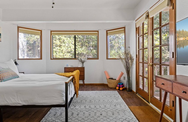 Romantic Treetop Retreat | Fireplace and large Deck