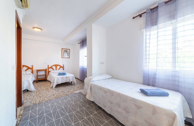Room 'Habitación Triple' with Wi-Fi and Air Conditioning