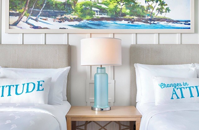 Room w/Balcony Overlooking Pool – Your Tropical Escape Awaits