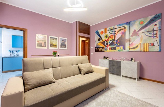 Roomy 75 sqm apartment a few steps from Parma train station. The accommodation is located on the second floor of a building with lift and can host up to 5 people. Please note that there is a step to access the structure.The building is located in the his
