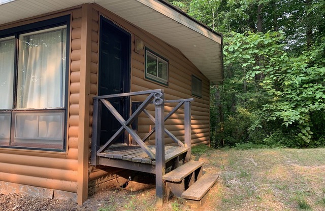 Rustic cabins in secluded campground with lake access and woods to wander in.