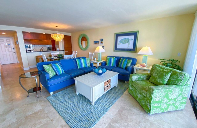 Sanibel Harbour Resort Harbour Tower 416: Relaxing in lanai gliders after a day of adventuring