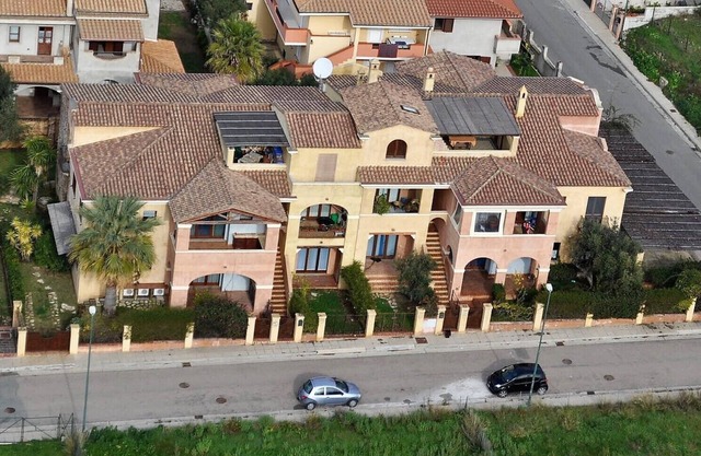 Sardinia - Villasimius, delightful three-room apartment with large covered veranda.
