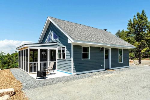 Scenic Lakeside Cabin with Fire Pit & Porch near Flanders Pond and Acadia Views in Sullivan, Maine