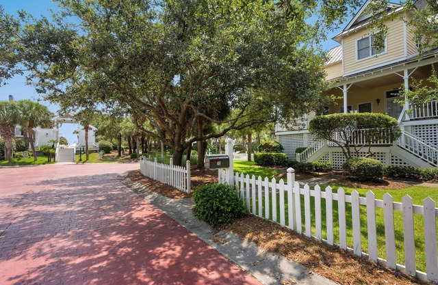 Screened porches, decks, rockers, hammocks and an upstairs balcony with ocean views